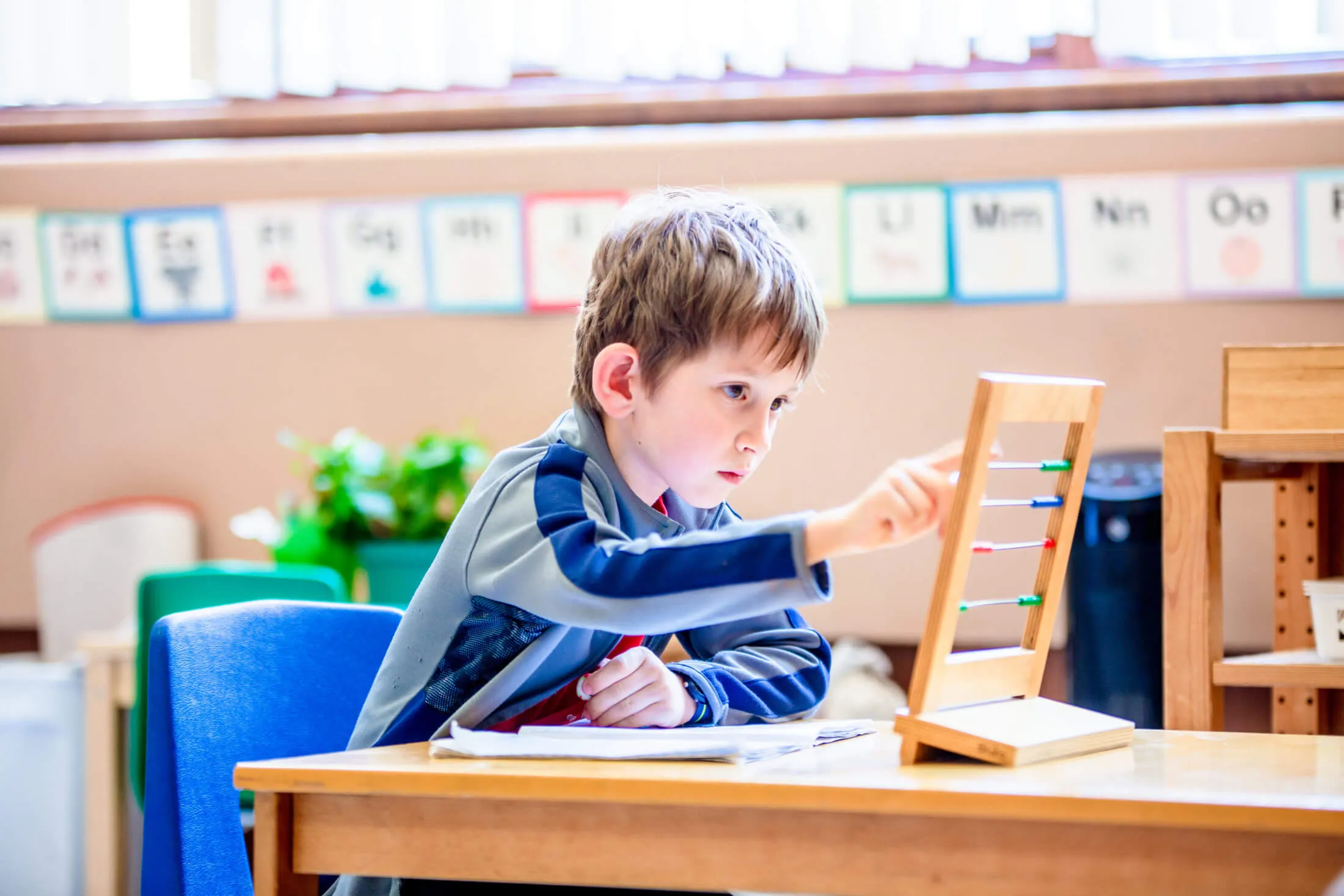 Children learning in a Montessori classroom at Forest Grove Pre-School in North York